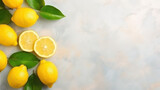 Fototapeta  - Fresh Juicy Lemons on light desk background. Top View on Light Desk with White Background