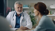 © BB_Stock - Elderly male doctor giving advice to a patient treatment or care
