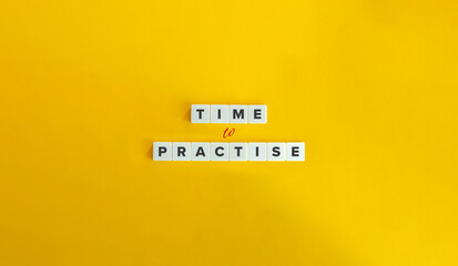 Wall Mural - time to practise phrase on letter tiles on yellow background. minimal aesthetic.