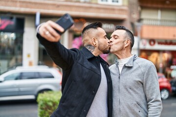 Poster - Two men couple make selfie by smartphone kissing at street