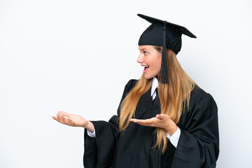 Wall Mural - Young university graduate caucasian woman isolated on white background with surprise facial expression