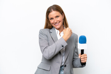 Wall Mural - Young caucasian tv presenter woman isolated on white background celebrating a victory