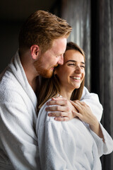 Poster - Beautiful young couple enjoying and relaxing in SPA center. People enjoying weekend, holiday