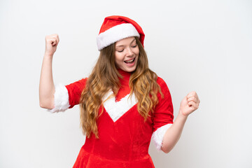 Canvas Print - Young caucasian woman with Christmas dress isolated on white background celebrating a victory