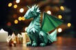 A green origami dragon sits next to a candle. This image can be used for various creative projects and themes.