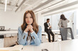© Maria Vitkovska - Smiling, beautiful woman in stylish suit working in modern office, looking at camera