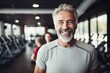 © sonatik - Elderly man smiling in the gym by Generative AI