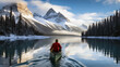 Male traveler in winter coat canoeing in Spirit Island on Maligne Lake at Jasper national park, AB, Canada