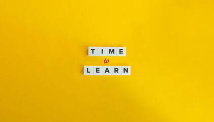 Wall Mural - time to learn banner. letter tiles on yellow background. minimal aesthetic.
