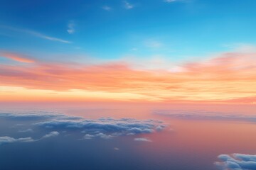 Wall Mural -  a photo taken from an airplane of a sunset over the ocean with clouds and a plane in the foreground.
