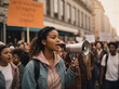 Woman with megaphone, A woman shouting through megaphone on a workers environmental protest in a crowd in a big city