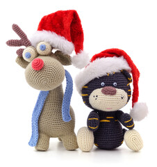 Sticker - Knitted deer and tiger in Christmas hats.