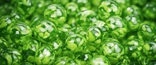Chrome And Lime Marbled Glass Beads Wallpaper