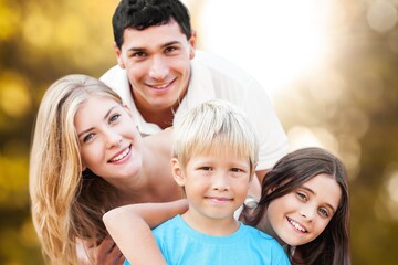 Sticker - Happy young parents with children outdoor