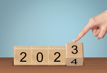 Poster - Starting 2024 new year on wooden blocks.