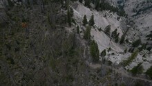 High Angle Aerial Of Dirt Biker On Mountain Ridge Trail In Idaho In Boise National Forest
