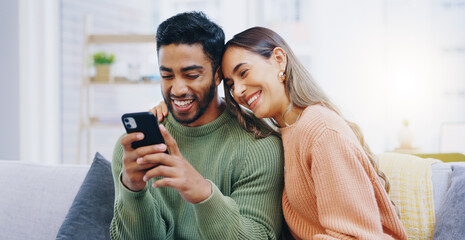 Poster - Couple, living room sofa and texting with phone, smile and click for contact, meme and notification in home. Man, woman and happy with smartphone, reading and app for social network, video and relax