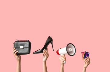 Poster - Female hands with women accessories, megaphone and credit cards on pink background. Black Friday sale