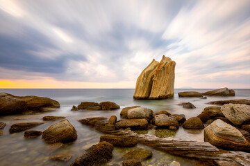 Wall Mural - Long exposure photograph in the field of sail rocks in Foca district of Izmir province.