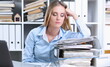 © H_Ko - Lot of work wait for tired and exhausted woman. Huge pile of document folders headache and depression irs new problems emotion expression vacancy or holiday dream concept