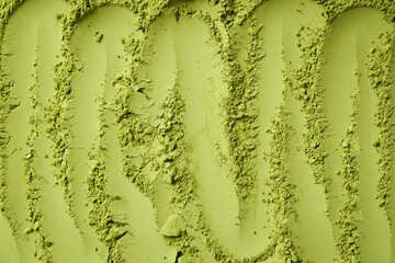 Green powder. Matcha tea. Green texture. Top view.