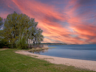 Wall Mural - Sunset at a lake in the Mecklenburg Lake District