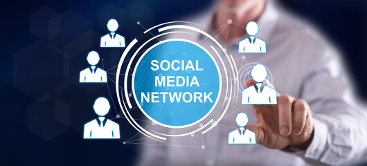 Wall Mural - Man touching a social media network concept