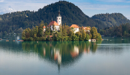 Wall Mural - Bled, Slovenia. 09 30 2023. Island on lake Bled with old church