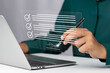 © GamePixel - Efficient Electronic Signature Concept, Businessman using stylus pen signs electronic documents on digital documents on virtual tablet. Signing electronic documents for paperless transactions.