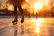 close-up partial view of woman in skirt in skates ice skating on rink