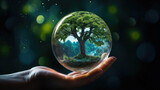 Fototapeta Natura - Crystal Glass Ball and Tree, Conceptualizing Environmental Harmony and Sustainable Development