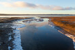 © Anne Richard - Early winter sunrise view of the Cap-Rouge River entering the St. Lawrence River at low tide with couple of Mallard ducks floating in the water, Quebec City, Canada