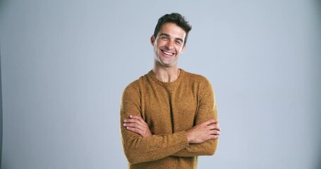 Wall Mural - Crossed arms, happy and face of man in studio with positive attitude, confidence and happiness. Smile, fashion and portrait of isolated person in trendy, casual clothes and style on gray background