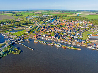 Wall Mural - Aerial from the historical town Zoutkamp in Friesland the Netherlands