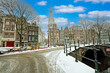 Snowy Amsterdam with the Zuiderkerk in winter in the Netherlands