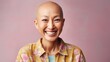 Joyful cancer survivor in pastel clothes strikes a pose in a serene studio environment.