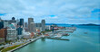 San Francisco city aerial The Embarcadero with boats docked in bay and downtown skyscrapers CA