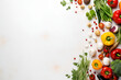 Layout of vegetables on a light background with space for text and design.