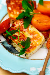 Canvas Print - Halloumi cheese with apricots on an outdoor grill