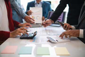 group businessmen and investors met together in conference room to view annual results their investments in business together in order to plan marketing doing business that would produce better result