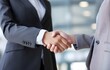 © Oleksiy - Close-up of handshake of businesswoman and businessman