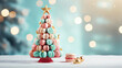 Christmas background with decorative Christmas tree with copy space. Sweet macaroons arranged in a Christmas tree with a star on the top.