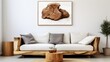 White sofa cushions on wood slab, rustic tree stump side table near white wall with big poster frame. Minimalist home interior design of modern living room, Generative AI