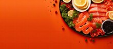 On An Overhead View, A Red Plate Displayed An Array Of Delicious Seafood Appetizers Such As Salmon, Caviar, And Finger Snacks, With A Hint Of Lemon Adding A Tangy Twist To The Salty Fish.