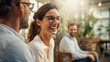 © Studio Nova - Businesswoman engaged in a meeting with smiles and a sense of collaboration against office background