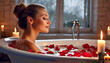 Kobieta biorąca kąpiel z płatkami róż. Wanna otoczona płonącymi świecami. Motyw relaksu i domowego spa