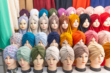 Wall Mural - Mannequins wearing head scarves in the Tunis souk.