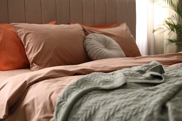 Sticker - Bed with stylish cotton linens in room