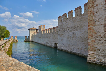 Poster - Beautiful view of the castle in Sirmone (Castello Scaligero di Sirmione) on Lake Garda. Province of Brescia, Italy.