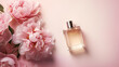 Bottle of perfume with flowers on a clean minimal background